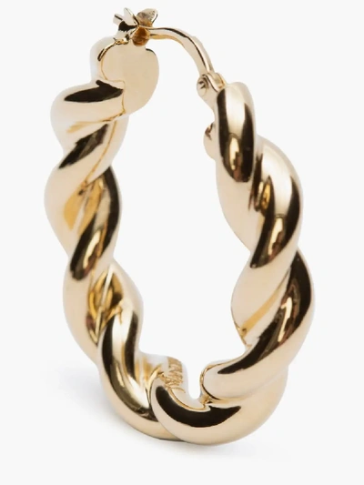 Shop Jw Anderson Twisted Hoop Earrings In Gold
