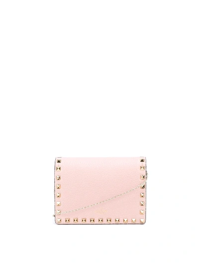 Shop Valentino Rockstud Pebble Leather Cross Body Bag In Pink