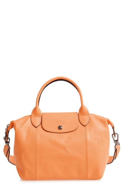 Shop Longchamp Le Pliage Cuir Leather Shoulder Bag - Orange In Melon