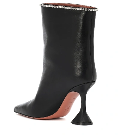 Shop Amina Muaddi Mia Crystal-embellished Ankle Boots In Black