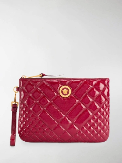 Shop Versace Quilted Medusa Clutch In Red