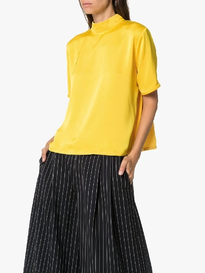 Shop Mira Mikati Pom Pom Detail Wool Top In Yellow