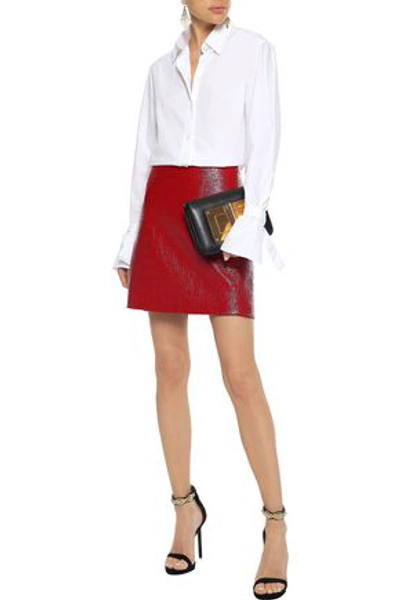 Shop Versace Coated Cotton-blend Tweed Mini Skirt In Crimson