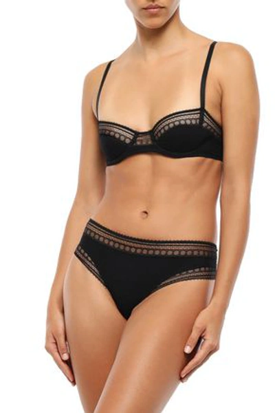 Shop Eres Super Leavers Lace-trimmed Stretch-cloqué Mid-rise Thong In Black