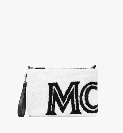 Shop Mcm Crossbody Pouch In Contrast Logo Shearling In White | Cloud Dancer