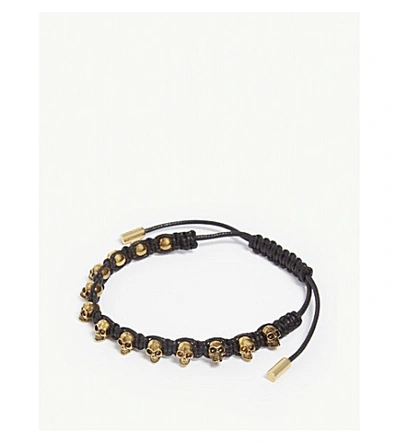 Shop Alexander Mcqueen Skull-embellished Leather Bracelet In Gold