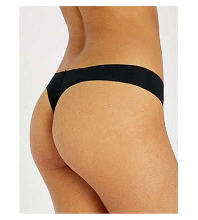 Shop Calvin Klein Women's Black Invisibles Jersey Thong