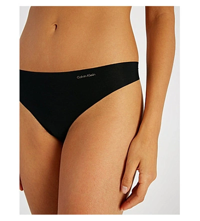 Shop Calvin Klein Women's Black Invisibles Jersey Thong