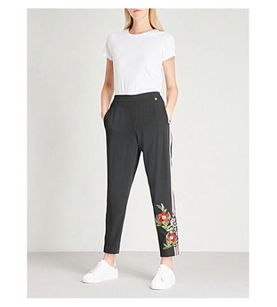 Shop Ted Baker Madlyne Kirstenbosch Embroidered Side-stripe Crepe Jogging Bottoms In Black