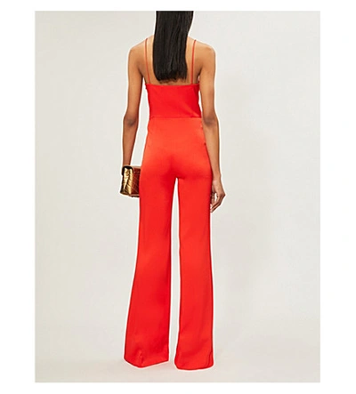 Shop Galvan Phoebe Sleeveless Satin Jumpsuit In Red