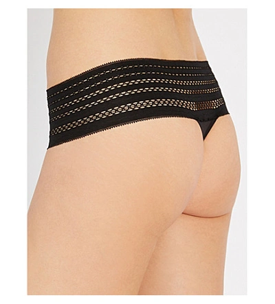Shop Dkny Classic Cotton Stretch-jersey Thong In Black
