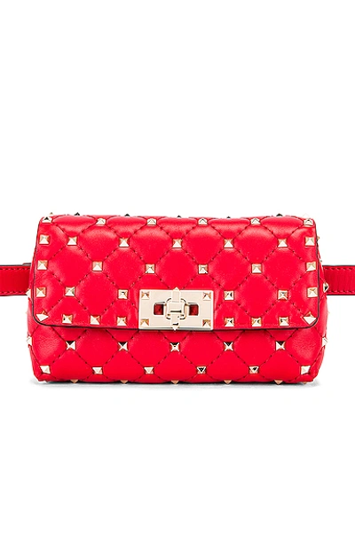 Shop Valentino Rockstud Spike Belt Bag In Red