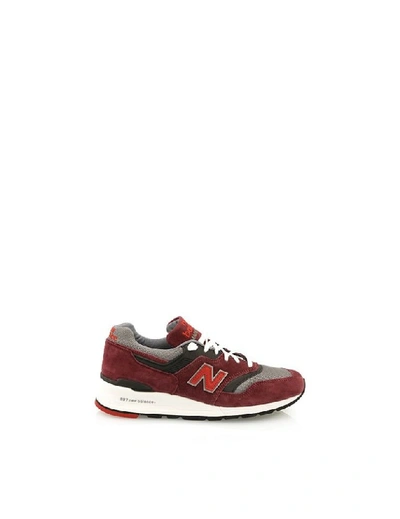 Shop New Balance Burgundy Suede Sneakers