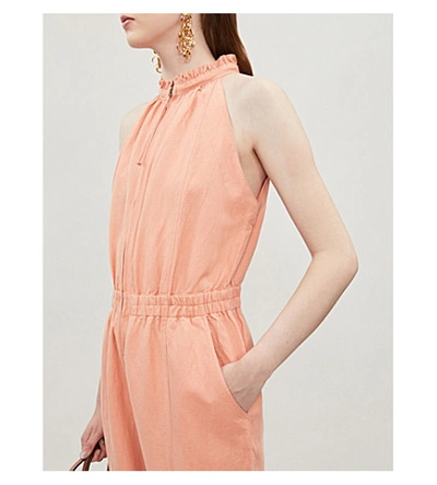 Shop Apiece Apart Archer Ruffled-neck Cotton-blend Jumpsuit In Summer Melon