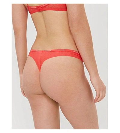 Shop Calvin Klein Sheer Marquisette Lace Thong In Lfx Fire Lily