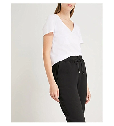 Shop Ninety Percent Ruby V-neck Cotton-jersey T-shirt In White