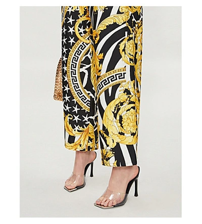 Shop Versace Baroque-print High-rise Wide Silk Trousers In Gold Print