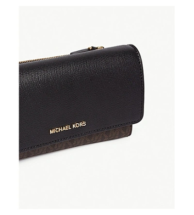 Shop Michael Michael Kors Leather Convertible Wallet In Blk/brown