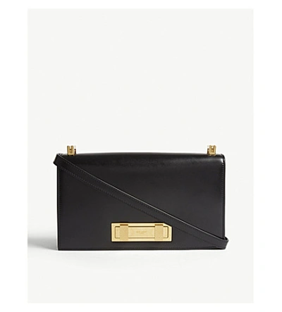 Shop Saint Laurent Black And Gold Domino Leather Shoulder Bag In Black/gold