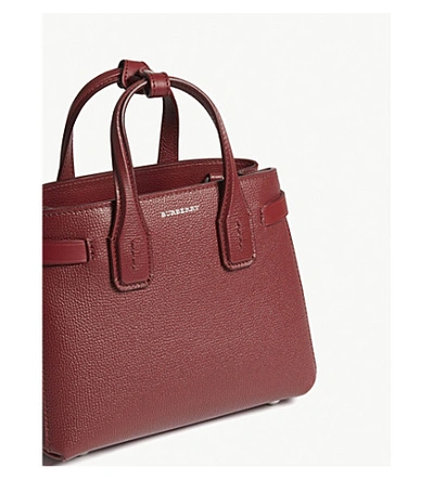 Shop Burberry Baby Banner Leather Tote In Crimson