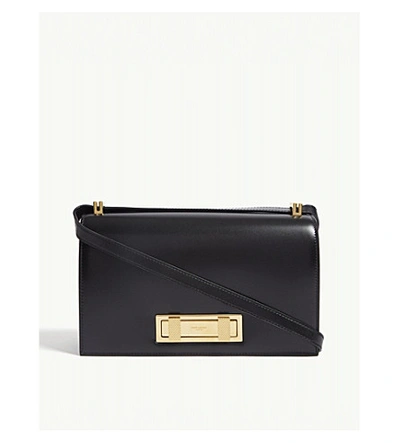 Shop Saint Laurent Black And Gold Domino Medium Leather Shoulder Bag In Black/gold