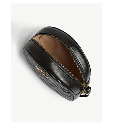 Shop Gucci Marmont Round Leather Quilted Camera Bag In Black