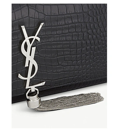 Shop Saint Laurent Kate Tassel Crocodile-embossed Leather Clutch In Black Silver