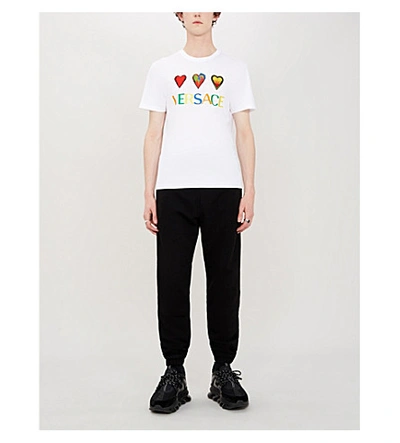Shop Versace Branded Cotton-jersey T-shirt In Bianco