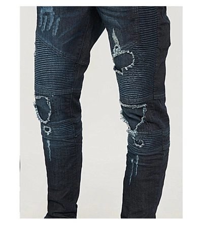 Shop Represent Biker Tapered Jeans In Indigo