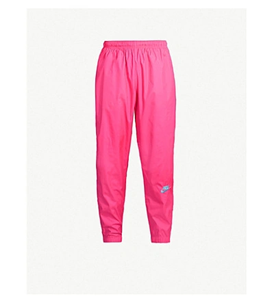 Shop Nike X Atmos Shell Trousers In Hyper Pink