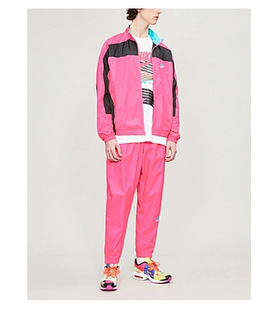 Shop Nike X Atmos Shell Trousers In Hyper Pink