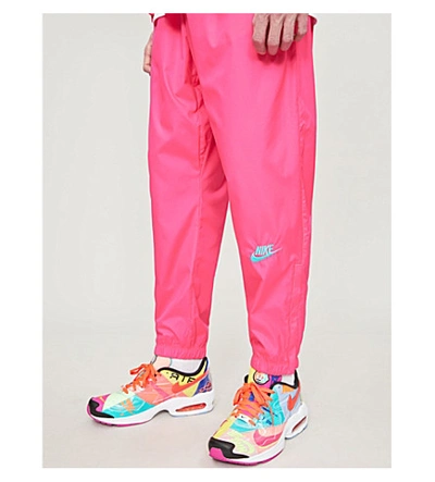 Shop Nike X Atmos Shell Trousers In Hyper Pink