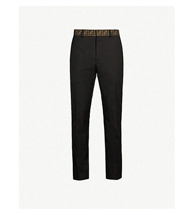 Shop Fendi Logo-print Slim-fit Straight Woven Trousers In Black