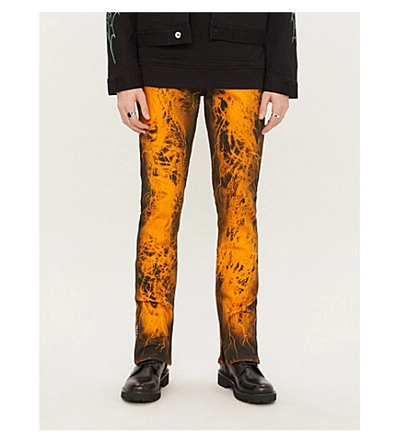 Shop Mjb Marc Jacques Burton X Will And Rich Pax Crixus Graphic-print Ripped Skinny Jeans In Black Orange