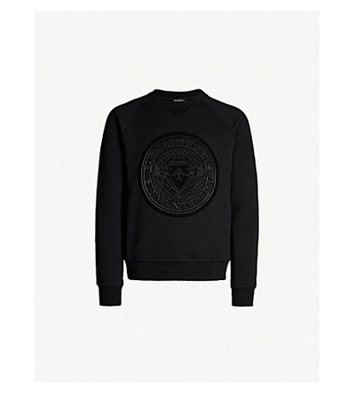 Shop Balmain Logo-flocked Cotton-jersey Sweatshirt In Black