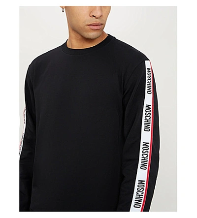 Shop Moschino Branded-tape Cotton-jersey Sweatshirt In Black