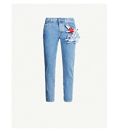 Shop Gucci Applique-embellished Tapered Jeans In Blue Multi