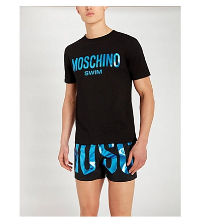 Shop Moschino Metallic Logo-print Relaxed-fit Swim Shorts In Blue