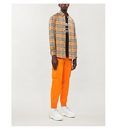 Shop Burberry Patch-pocket Cotton-jersey Jogging Bottoms In Bright Orange