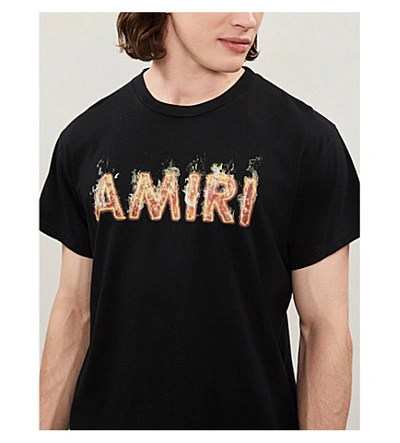 Shop Amiri Logo-graphic Cotton-jersey T-shirt In Tar