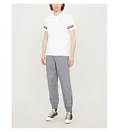 Shop Tommy Hilfiger Striped-trim Cotton-piqué Polo Shirt In White