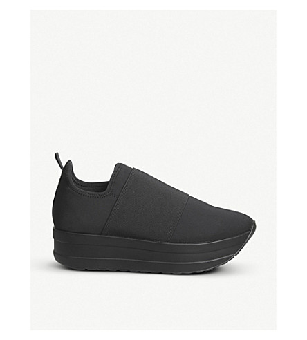 black elastic trainers