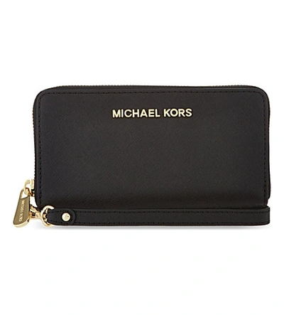 Shop Michael Michael Kors Jet Set Multi-function Phone Case In Black