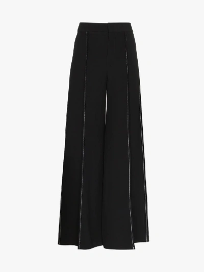 Shop Marni Contrast Stitch Flared Trousers In Black