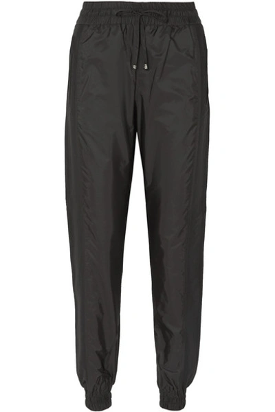 Shop Moncler Jersey-trimmed Shell Track Pants In Black