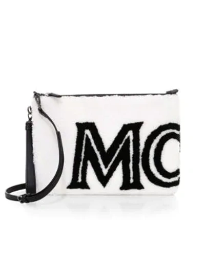 Shop Mcm Medium Logo Shearling Pouch In Cloud