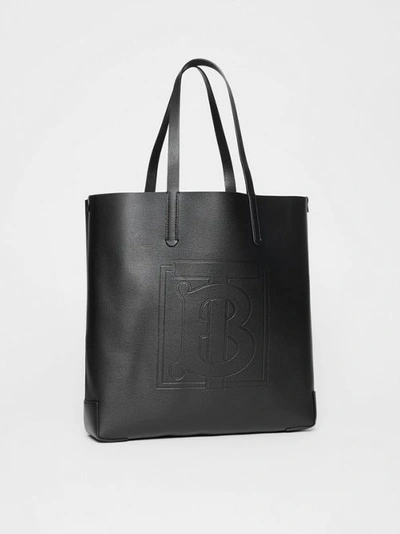 Shop Burberry Large Embossed Monogram Motif Leather Tote In Black