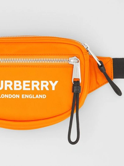 Shop Burberry Small Logo Print Econyl® Cannon Bum Bag In Bright Orange