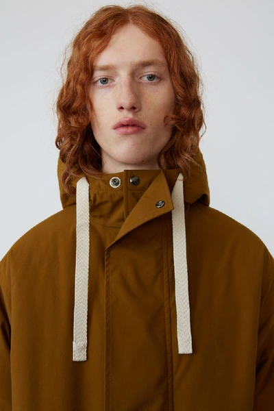 Shop Acne Studios Fishtail Parka Oil Yellow