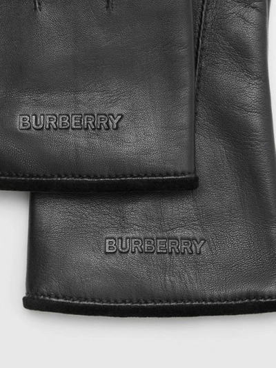 Shop Burberry Embossed Logo Cashmere-lined Lambskin Gloves In Black/black